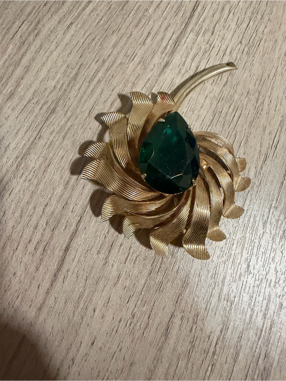 Gold-Tone Floral Brooch with Emerald Green Teardrop Stone
